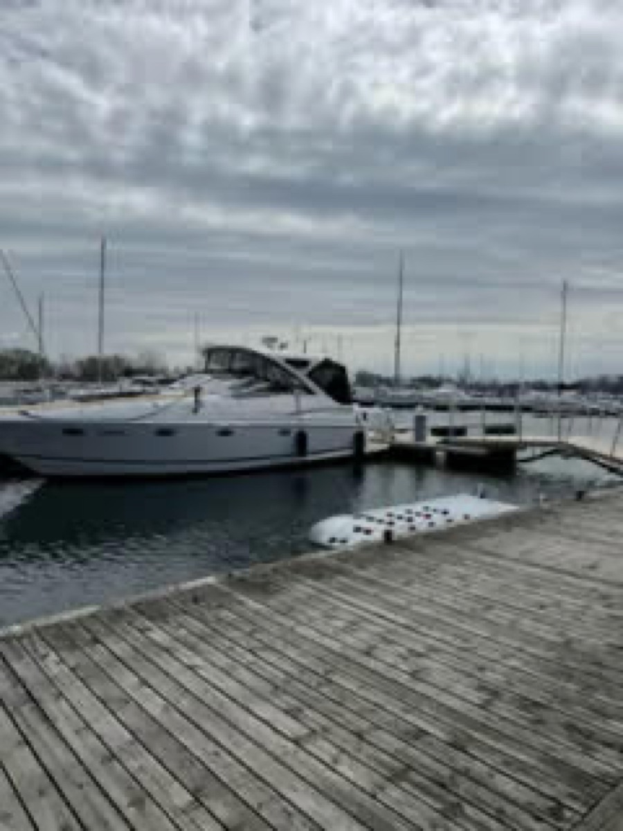 Cabin cruiser detailed at marina by 6ix Auto Care